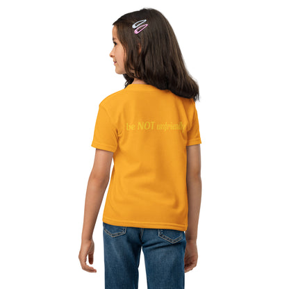 Child wearing a yellow t-shirt and blue jeans on a white background